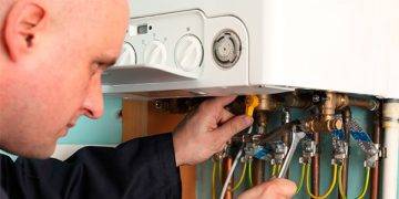 engineer-repairing-boiler